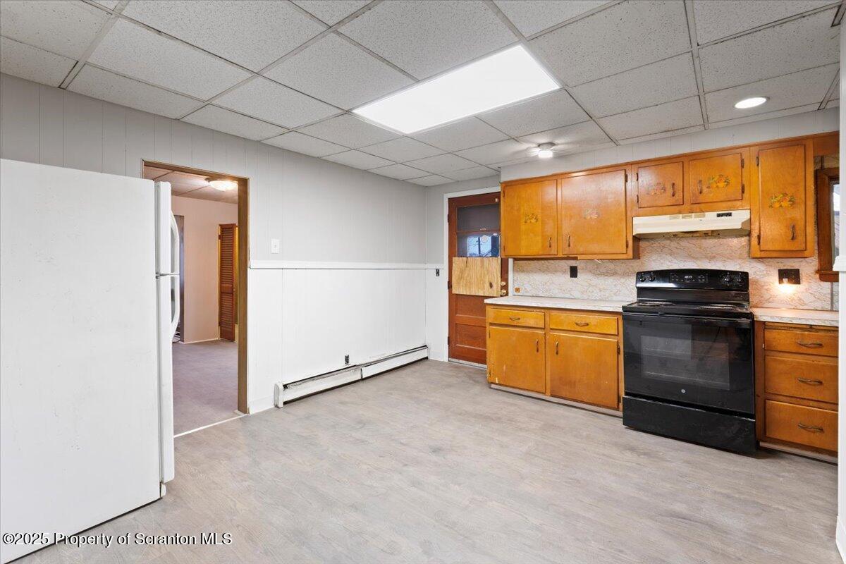 2515 North Main Avenue Scranton, PA 18508 - Photo 7 of 69 a kitchen with a stove a sink and a refrigerator