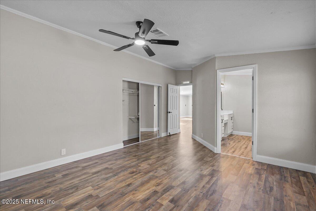 314 Union Avenue Interlachen, FL 32148 - Photo 22 of 30 a view of an empty room and wooden floor
