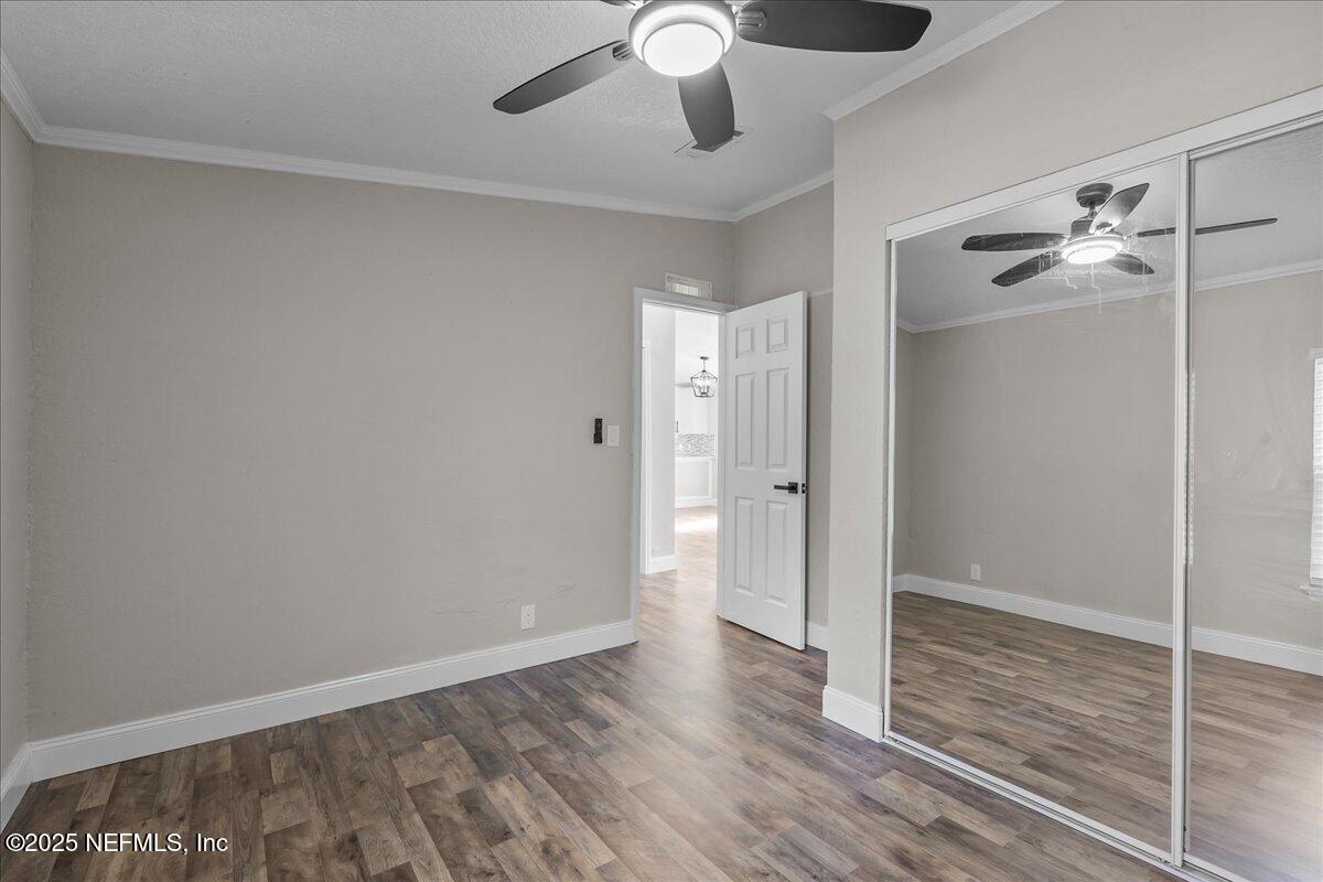 314 Union Avenue Interlachen, FL 32148 - Photo 26 of 30 a view of an empty room and wooden floor