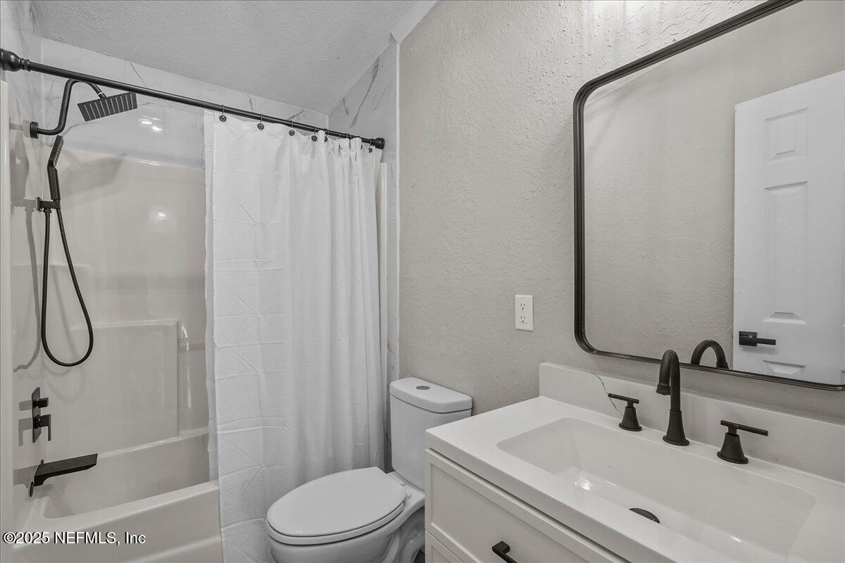 314 Union Avenue Interlachen, FL 32148 - Photo 27 of 30 a bathroom with a sink toilet and shower