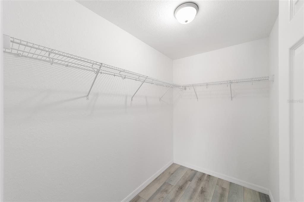 401 West Homeway Loop Citrus Springs, FL 34434 - Photo 20 of 23 a view of a room with racks on the wall