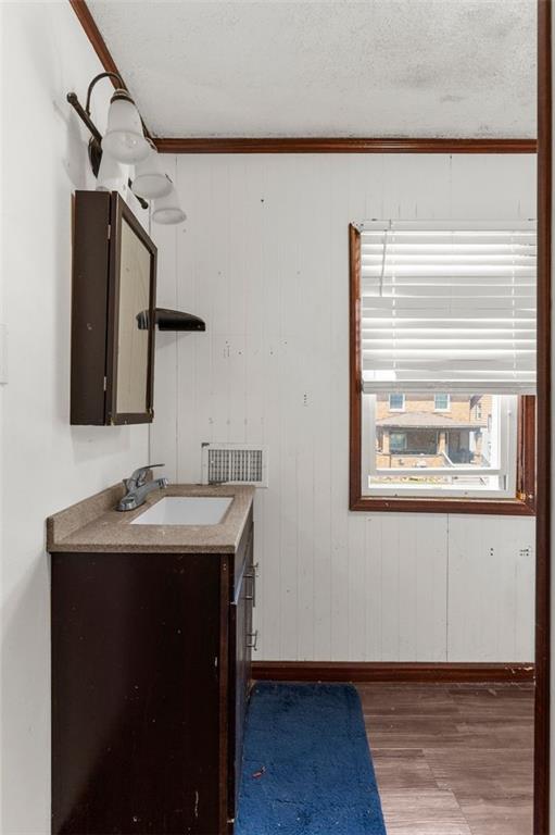 203 Baldwin Avenue Sharon, PA 16146 - Photo 22 of 27 a bathroom with a sink and a mirror