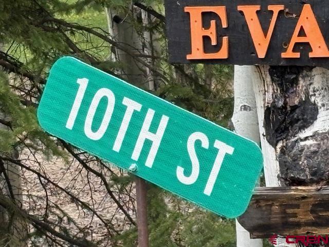 Tbd Tbd Adams Del Norte, CO 81132 - Photo 4 of 5 a street sign that is on a pole