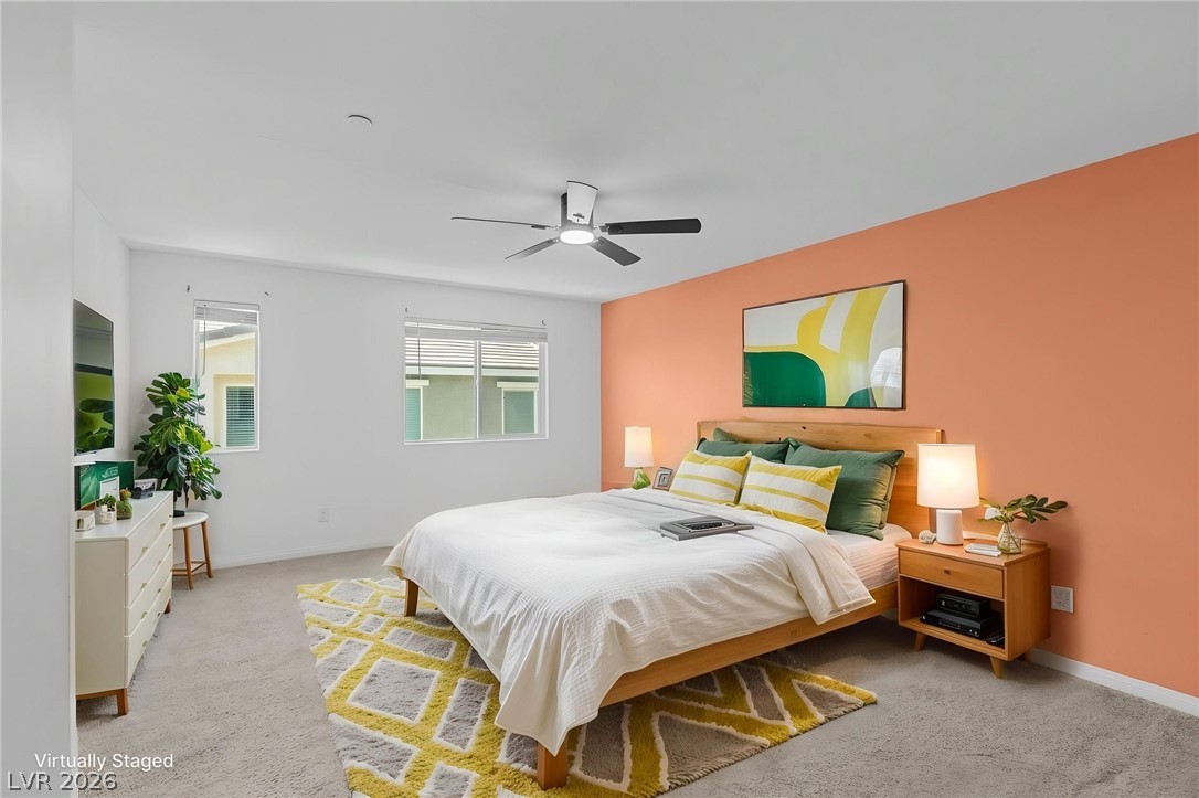12367 Indigo Montage Road, Unit 3 Las Vegas, NV 89183 - Photo 11 of 33 This cozy bedroom features bright walls and ample natural light, perfect for restful living.
