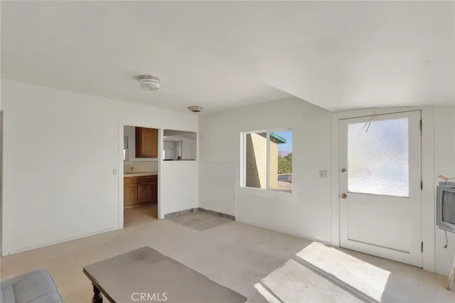 a view of a road with a building in the background