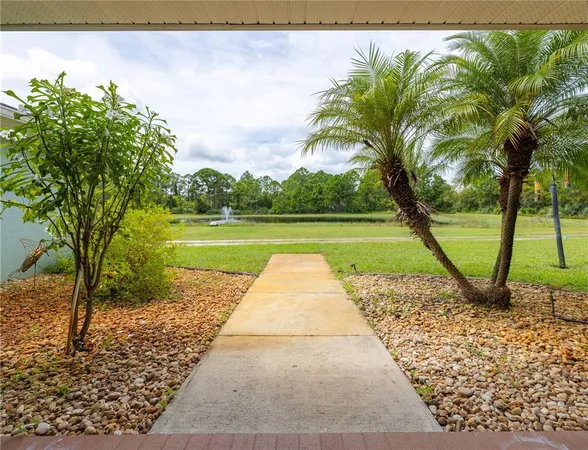 a view of swimming pool with a yard