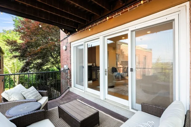 a view of a living room with furniture