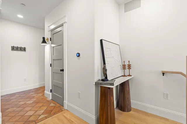 a spacious bedroom with a bed and a table