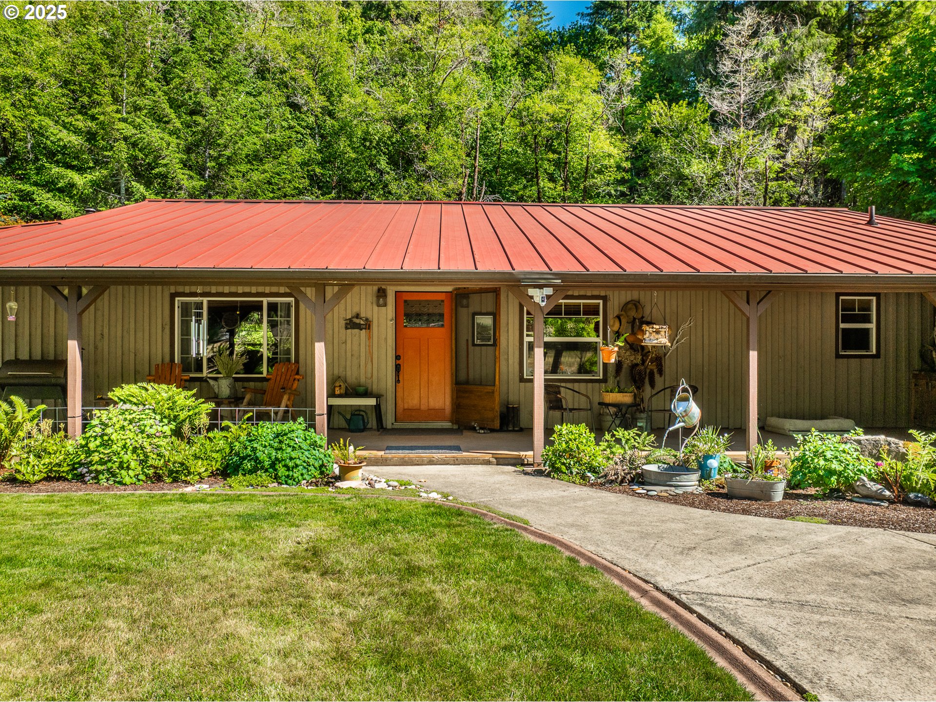 a front view of a house with garden