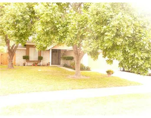 a view of swimming pool with large trees and large trees