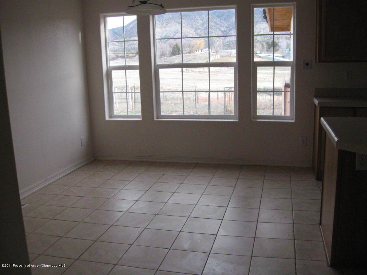 237 Rusty Spur Trail Rifle, CO 81650 - Photo 5 of 7 an empty room with windows