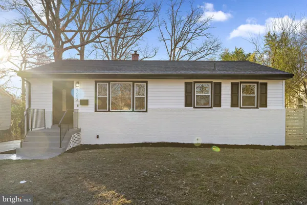 a front view of a house with yard