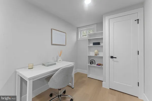 a view of a workspace with furniture