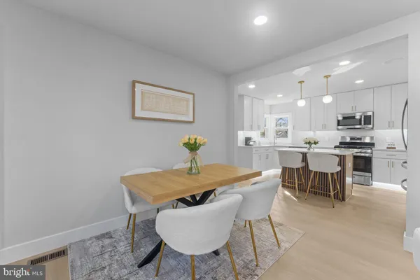 a view of a dining room with furniture