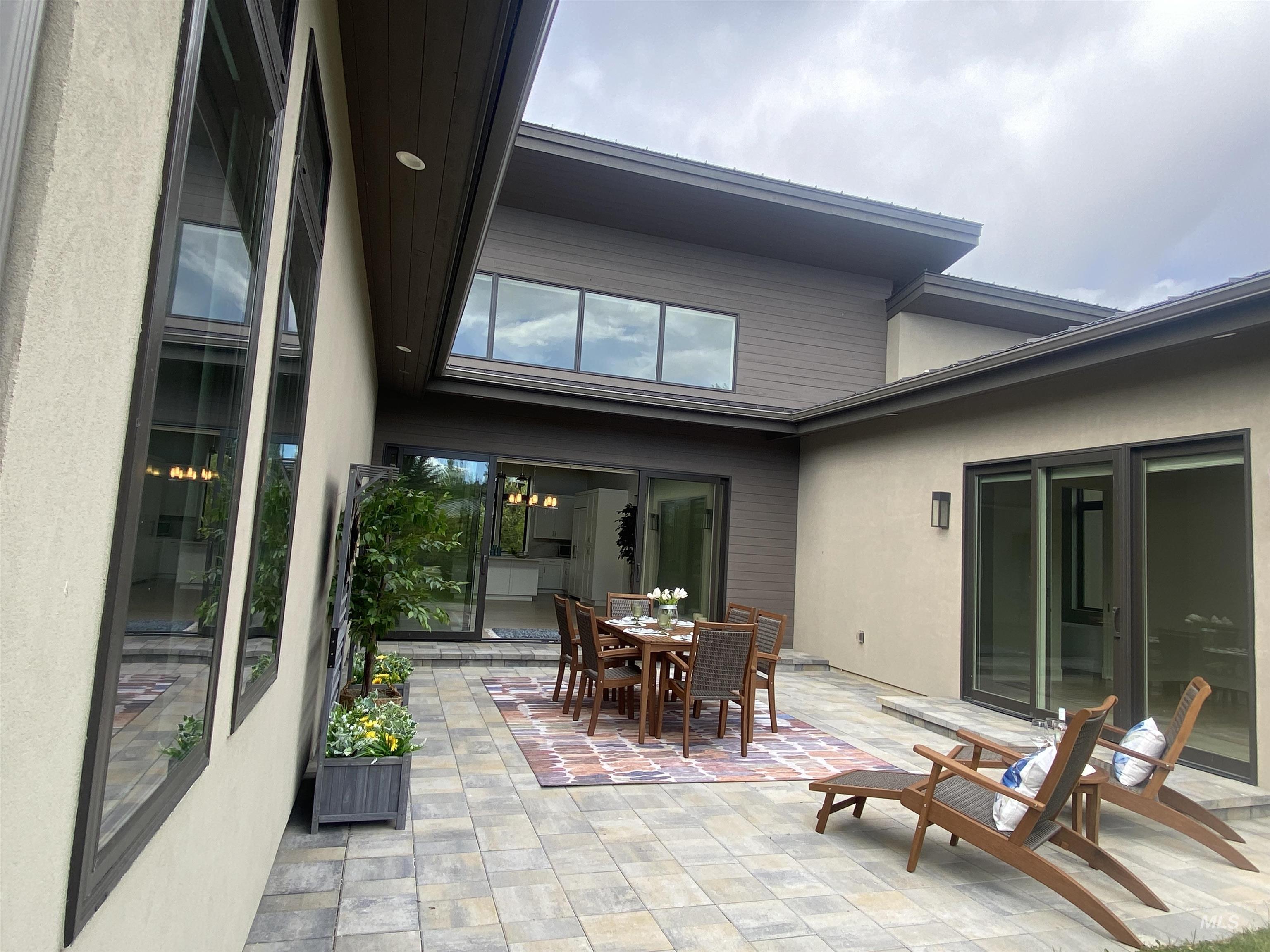 27 Streamside Drive Hailey, ID 83333 - Photo 13 of 39 Expansive paver patio with multiple seating areas