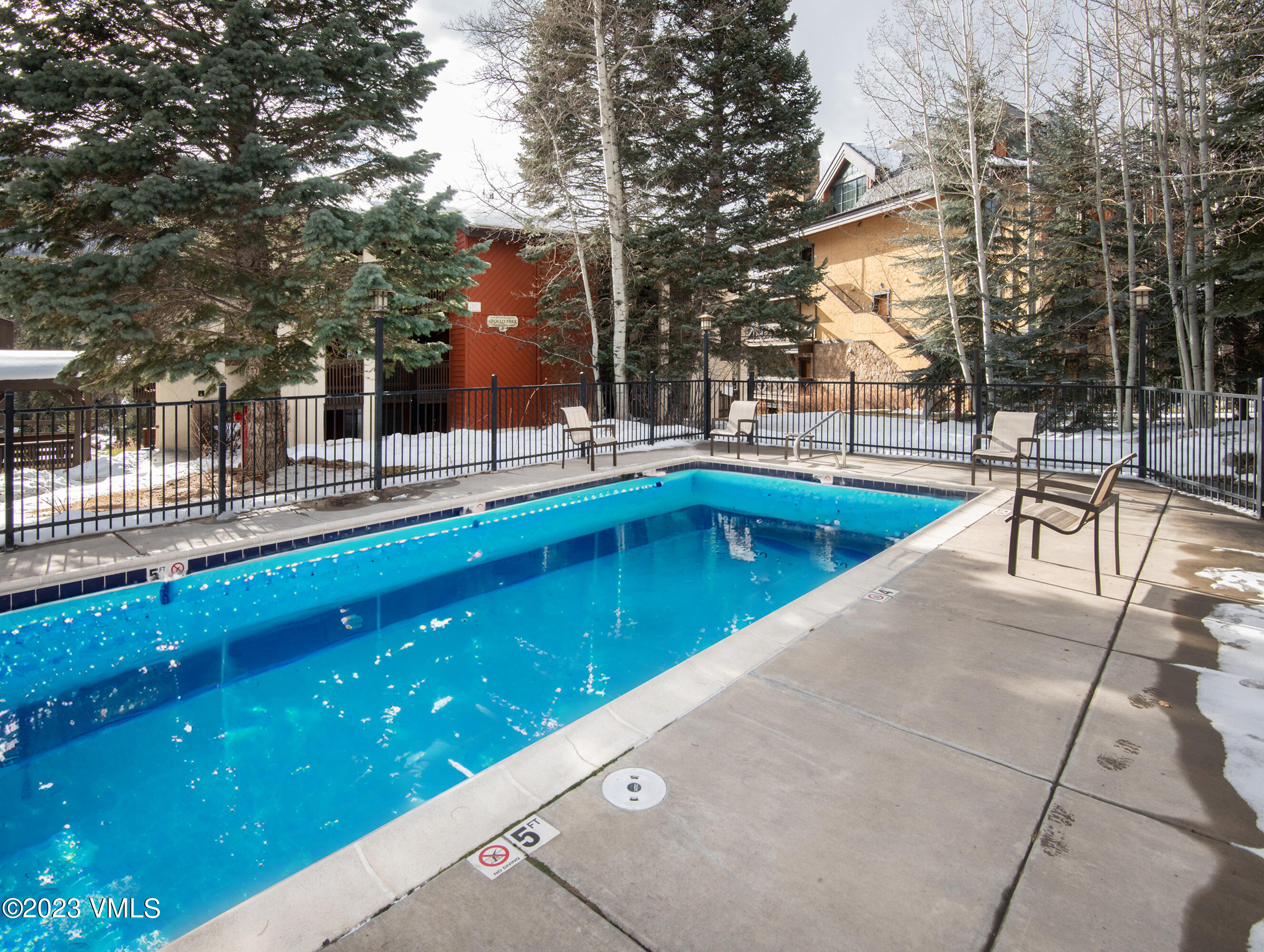 442 South Frontage Road East, Unit 103B Vail, CO 81657 - Photo 24 of 32 a view of a patio with swimming pool