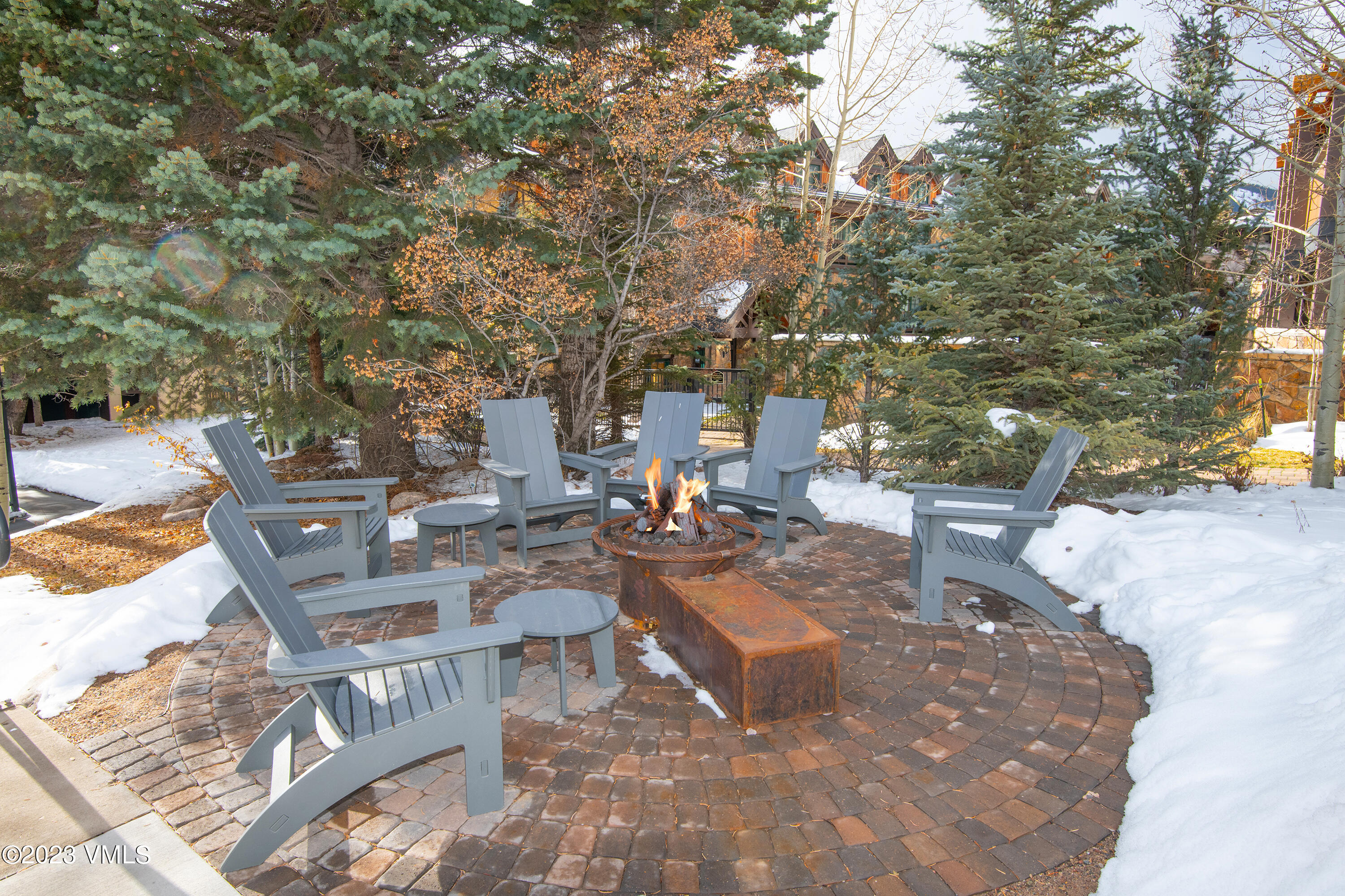 442 South Frontage Road East, Unit 103B Vail, CO 81657 - Photo 25 of 32 a view of a backyard with sitting area