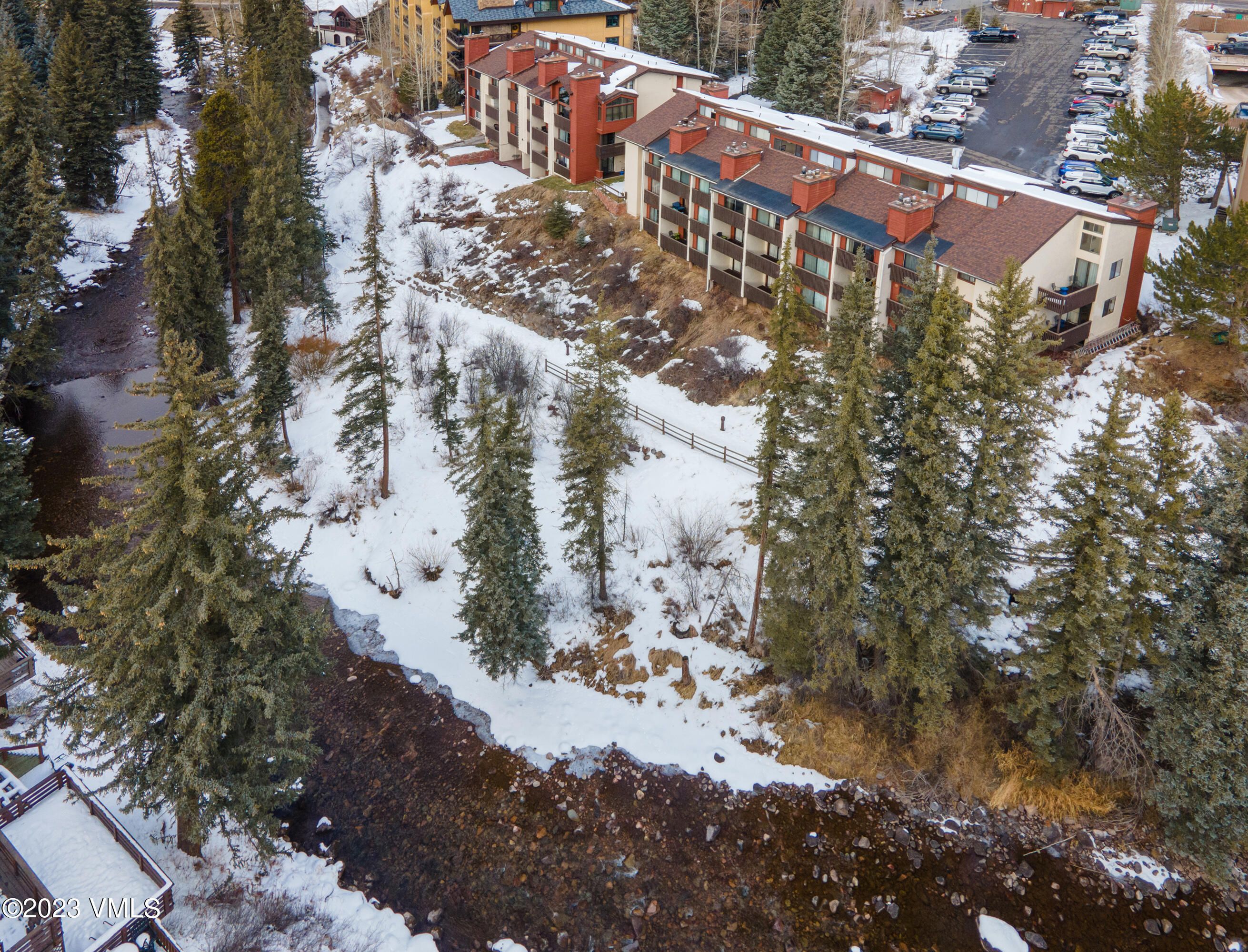 442 South Frontage Road East, Unit 103B Vail, CO 81657 - Photo 29 of 32 a view of a yard with a pathway