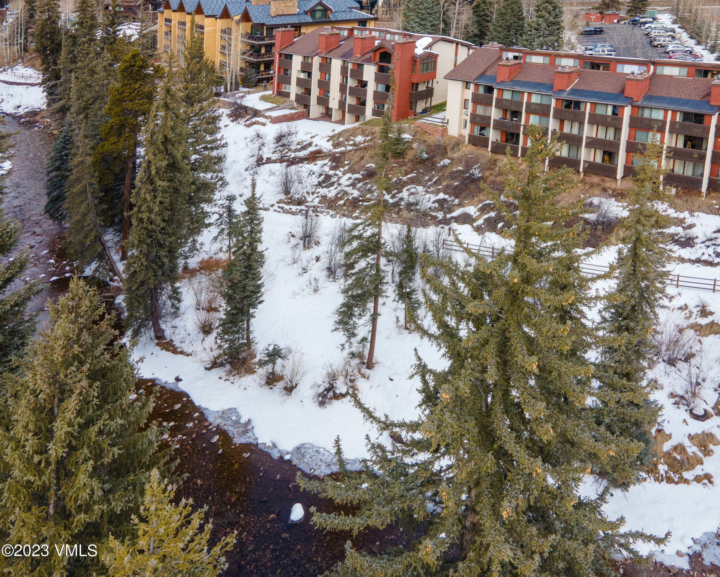 442 South Frontage Road East, Unit 103B Vail, CO 81657 - Photo 30 of 32 a view of residential houses with yard