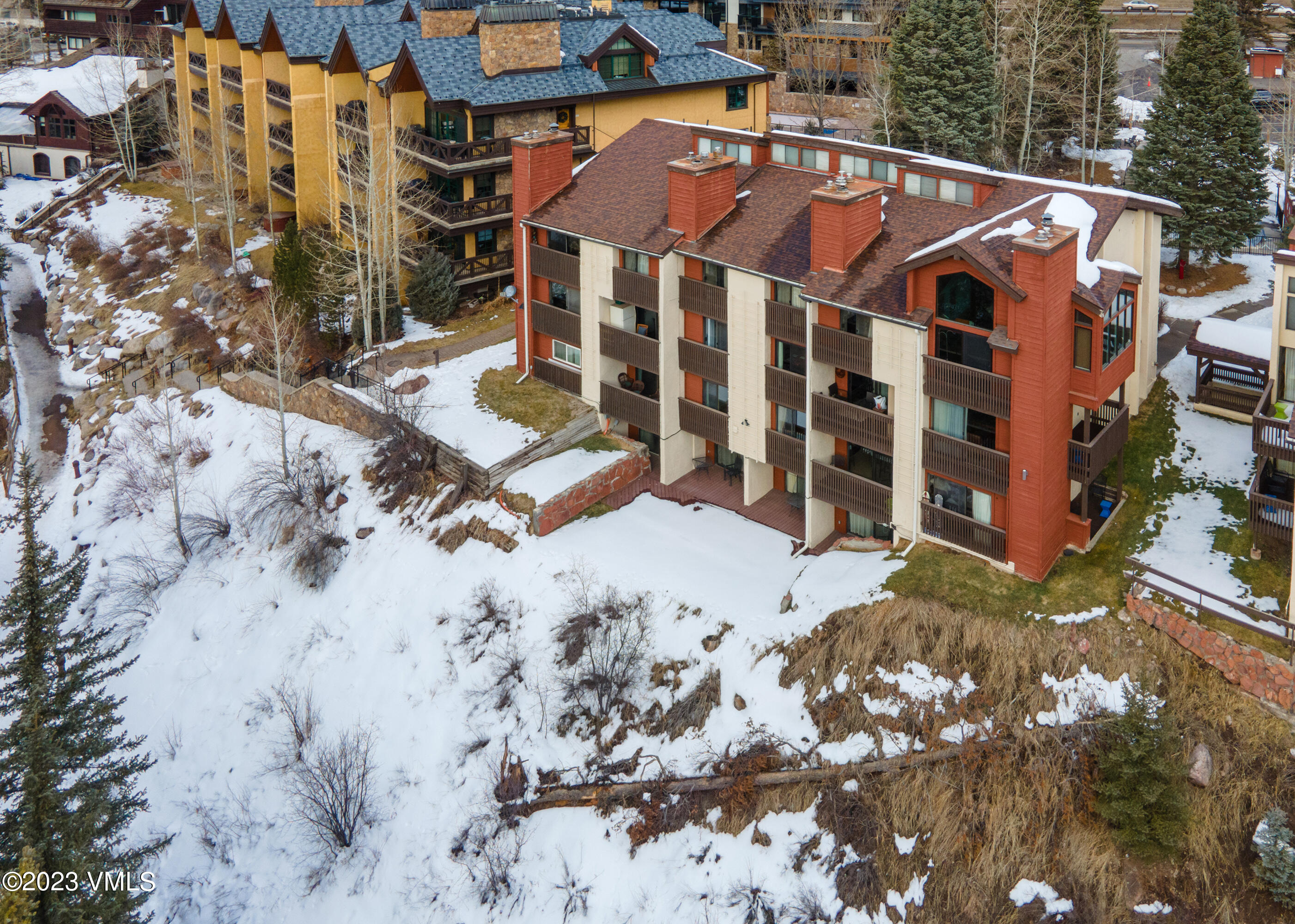 442 South Frontage Road East, Unit 103B Vail, CO 81657 - Photo 31 of 32 a view of a house with a yard