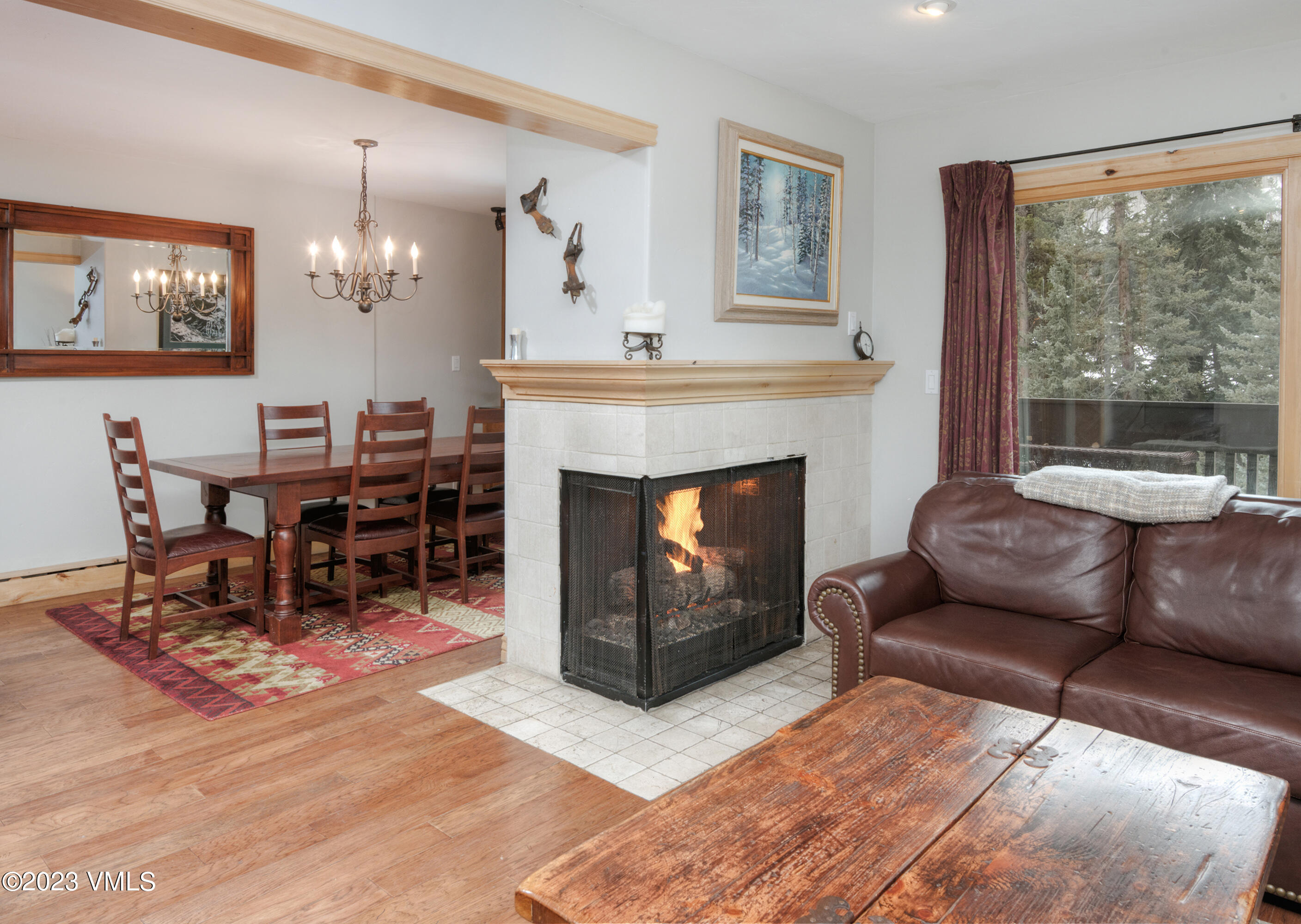 442 South Frontage Road East, Unit 103B Vail, CO 81657 - Photo 9 of 32 a living room with furniture and a fireplace