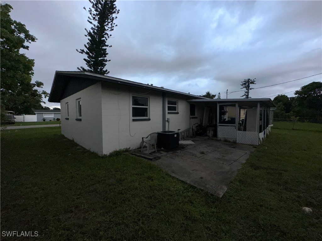 2196 Barry Drive Fort Myers, FL 33907 - Photo 15 of 17 a view of a house with backyard and garden