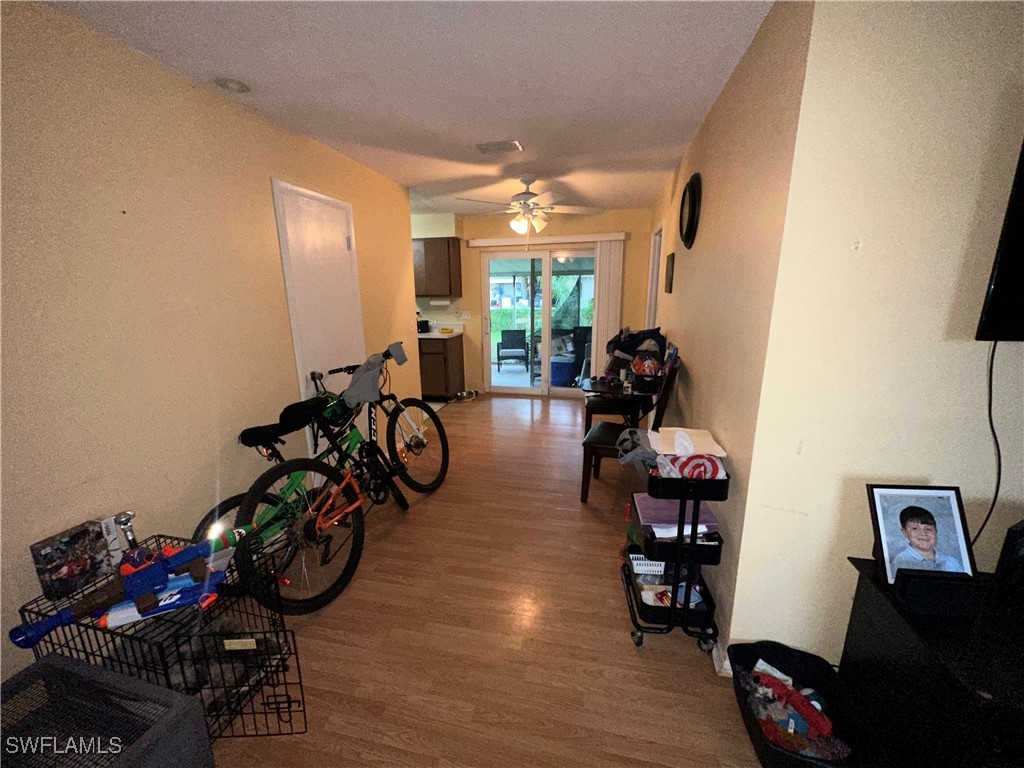 2196 Barry Drive Fort Myers, FL 33907 - Photo 5 of 17 a view of a room with gym equipment