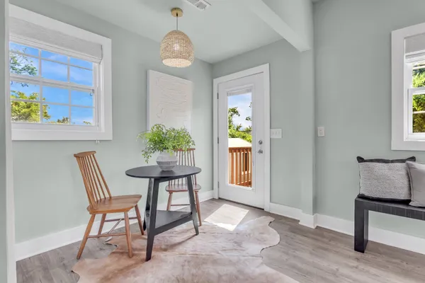 a view of a livingroom with furniture and window