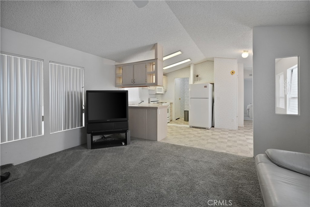 18420 Decker Road Perris, CA 92570 - Photo 8 of 26 a view of kitchen with furniture and refrigerator