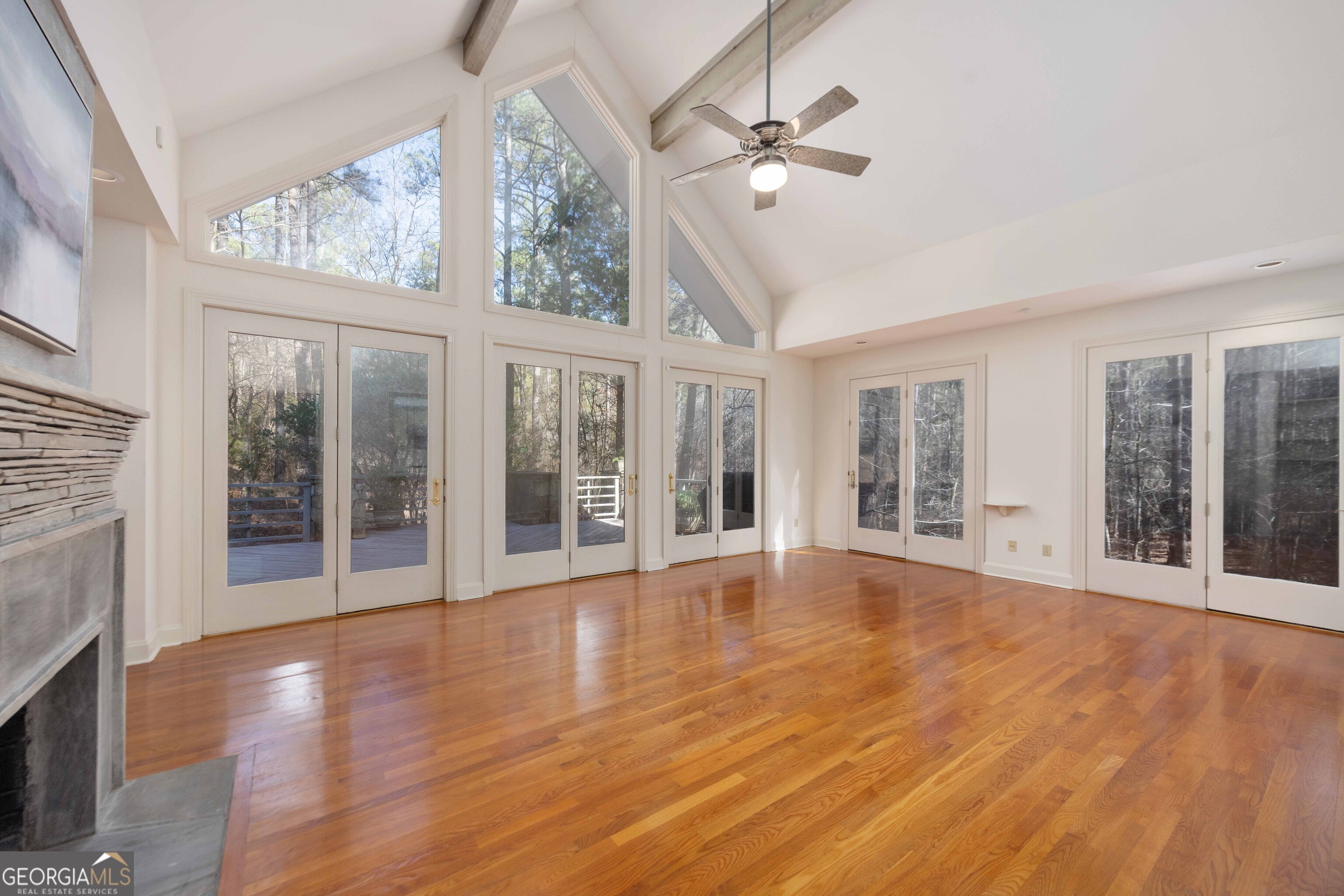 4 Mountain Ridge Court Columbus, GA 31904 - Photo 16 of 142 a view of an room with wooden floor fan and windows