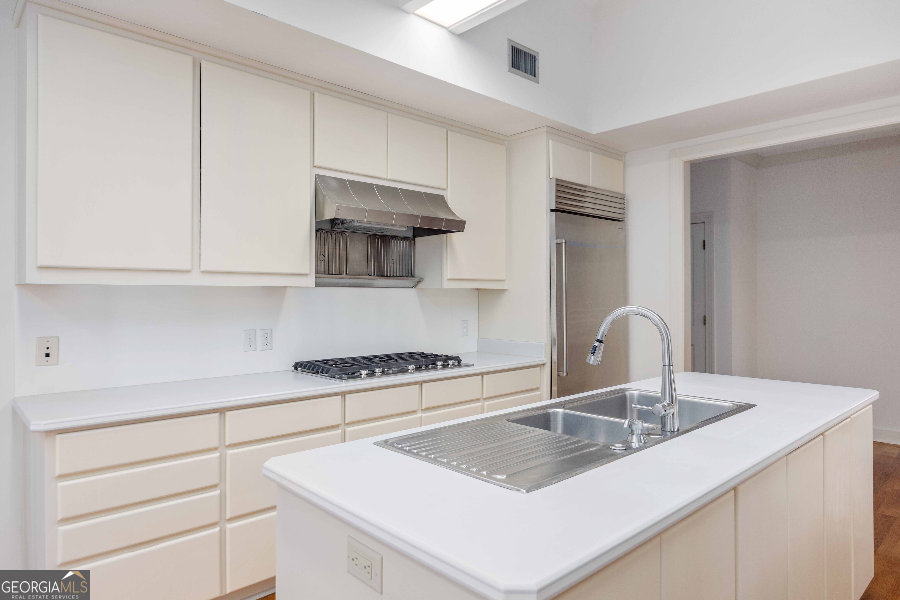 4 Mountain Ridge Court Columbus, GA 31904 - Photo 17 of 74 a kitchen with appliances a sink and cabinets