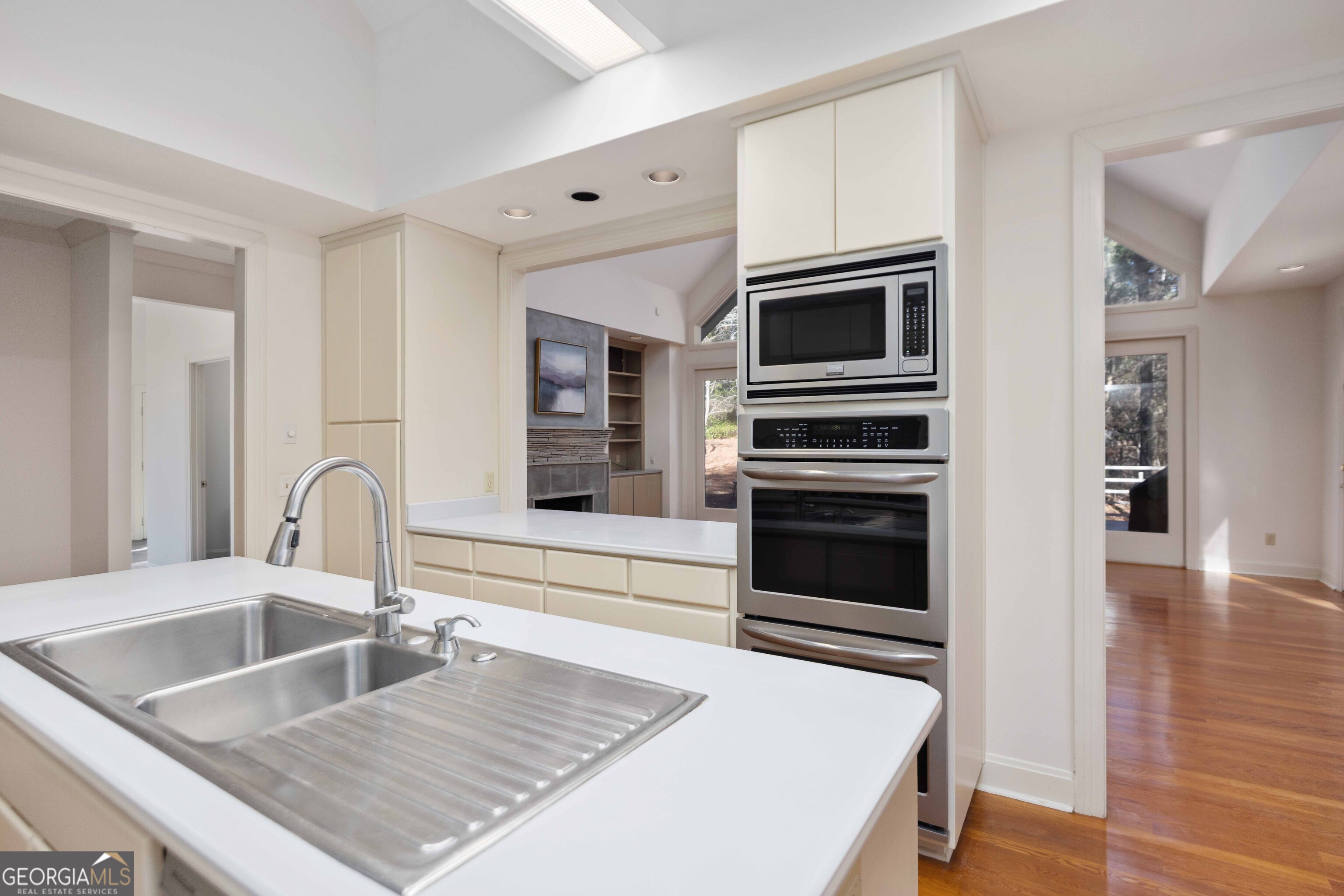 4 Mountain Ridge Court Columbus, GA 31904 - Photo 18 of 74 a kitchen with granite countertop a stove and a sink with granite countertops