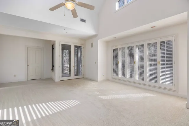 a view of a hallway with a window