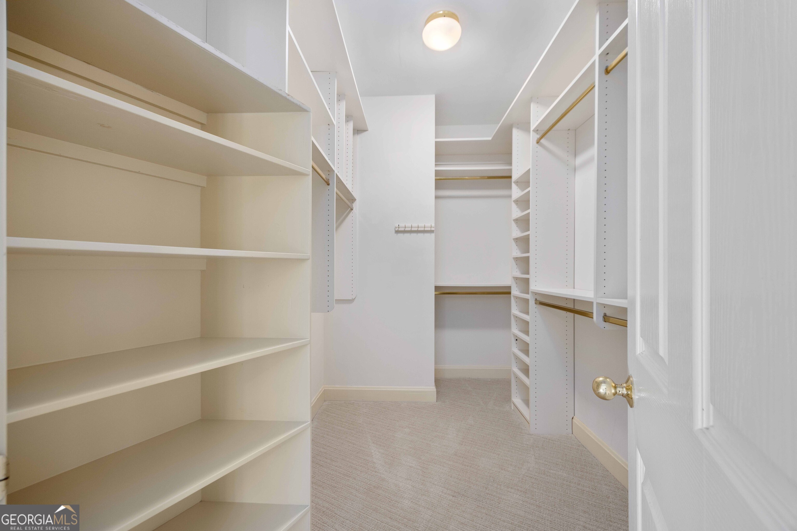 4 Mountain Ridge Court Columbus, GA 31904 - Photo 27 of 74 a view of walk in closet with empty racks