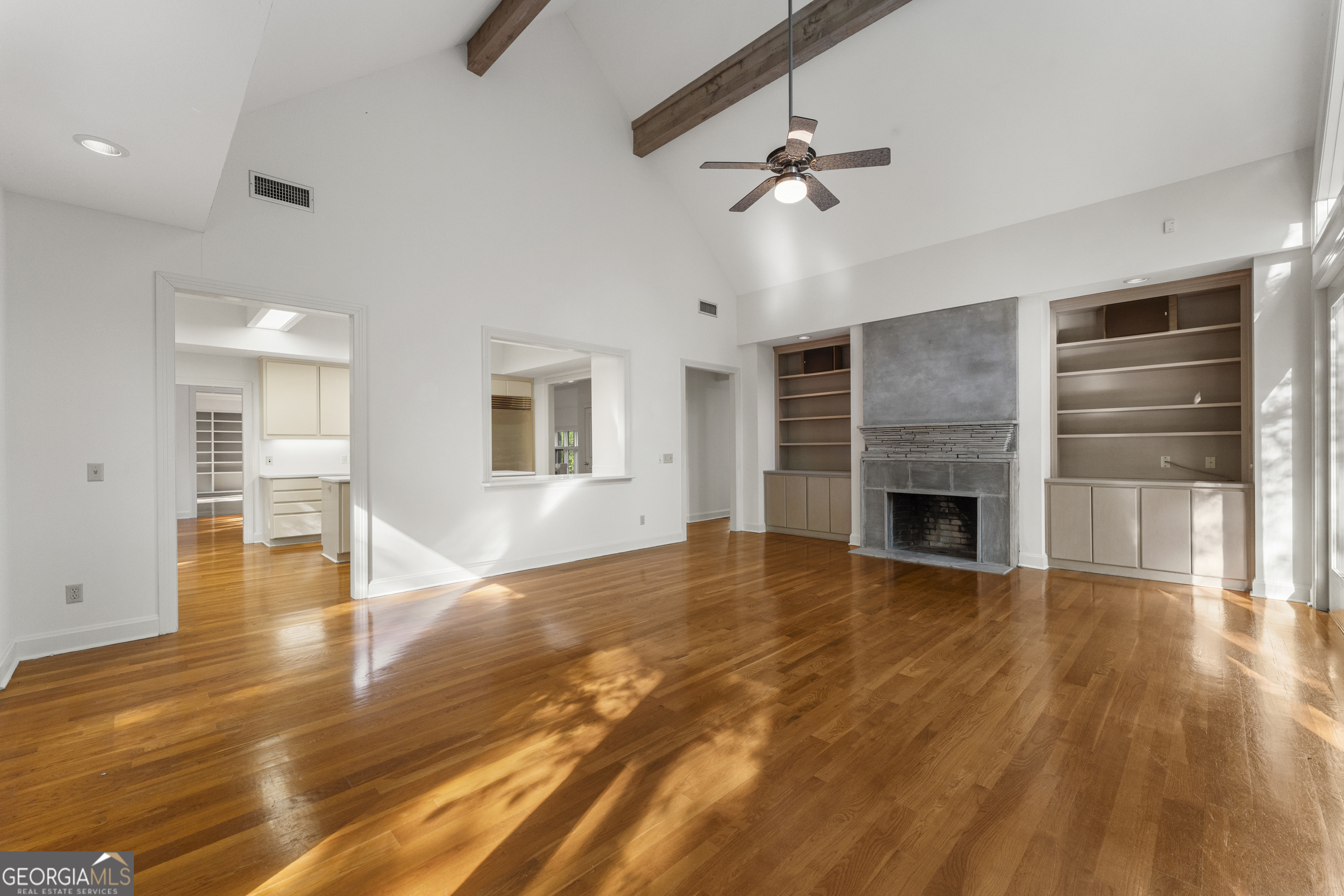 4 Mountain Ridge Court Columbus, GA 31904 - Photo 29 of 142 a view of empty room with wooden floor and fireplace