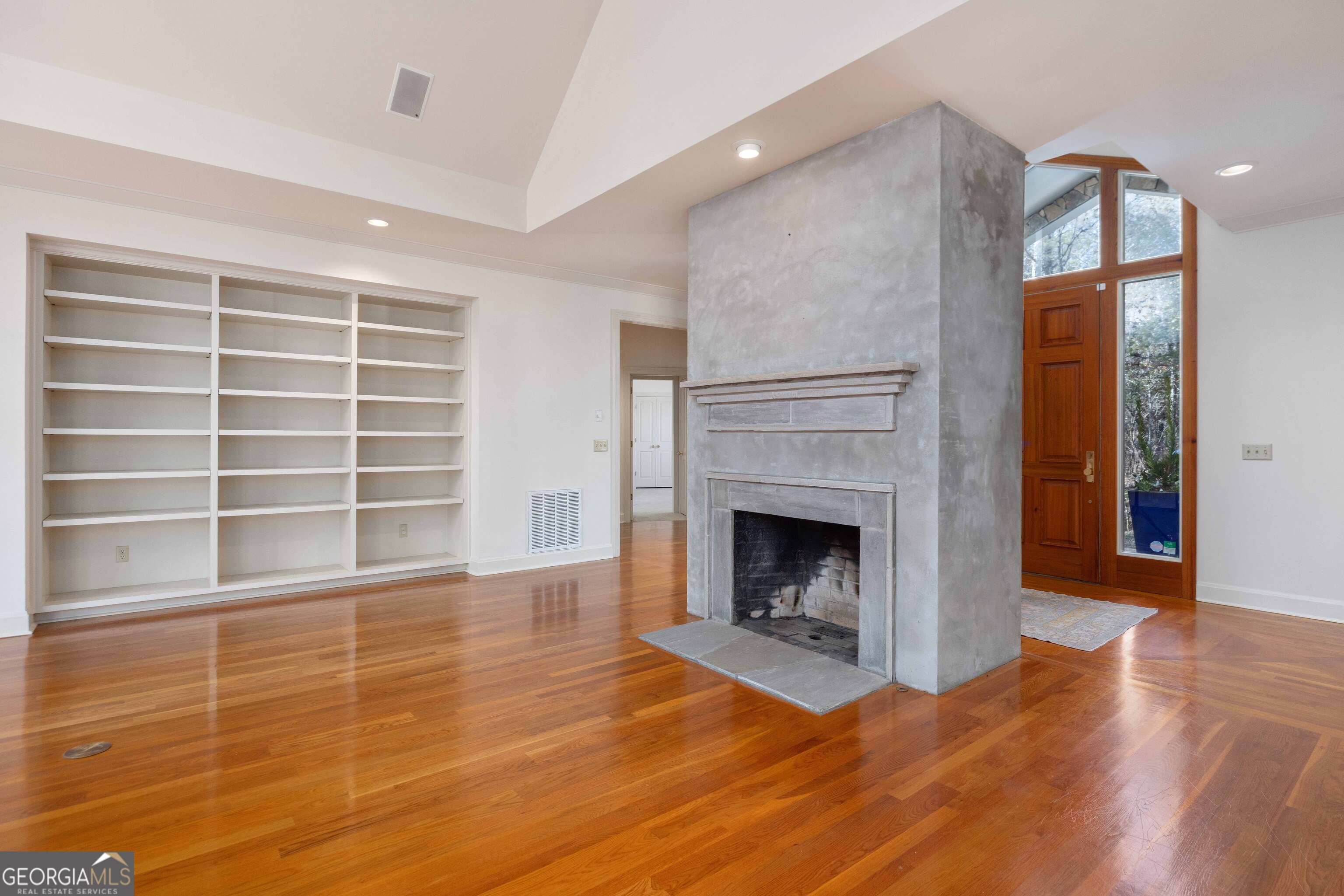 4 Mountain Ridge Court Columbus, GA 31904 - Photo 3 of 74 a view of an empty room with a fireplace and a window
