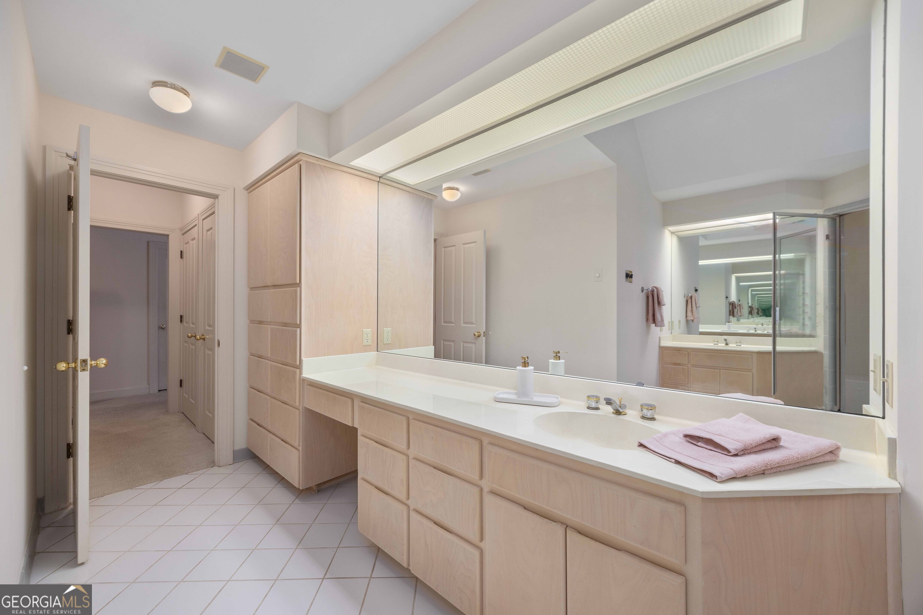 4 Mountain Ridge Court Columbus, GA 31904 - Photo 32 of 74 a bathroom with a sink and a mirror