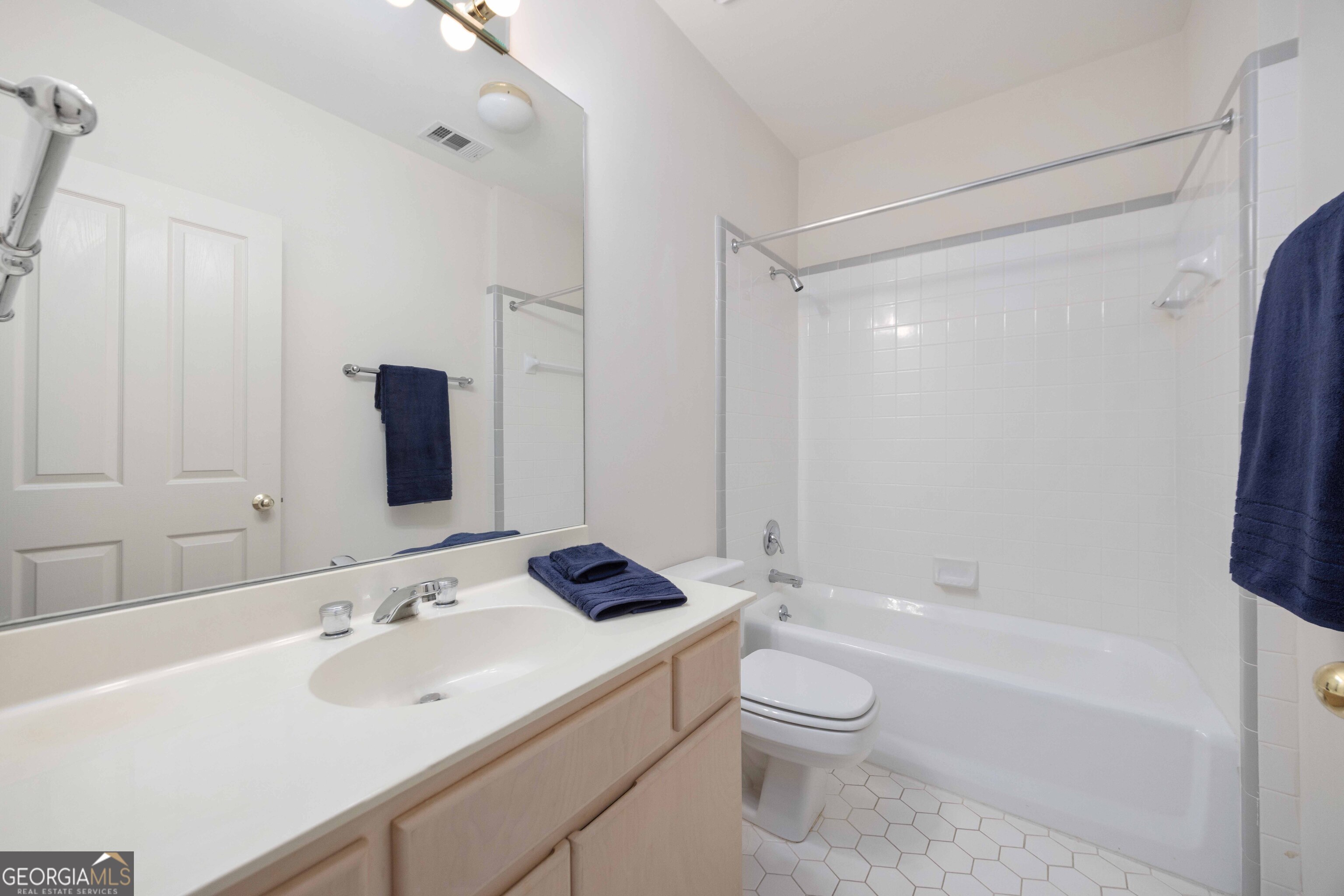 4 Mountain Ridge Court Columbus, GA 31904 - Photo 40 of 74 a bathroom with a sink a toilet and shower