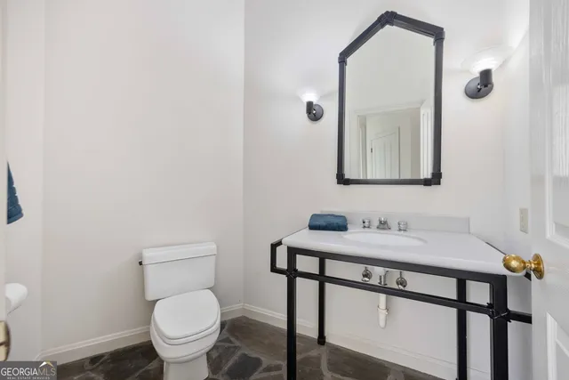 a view of a house with a yard and tree s