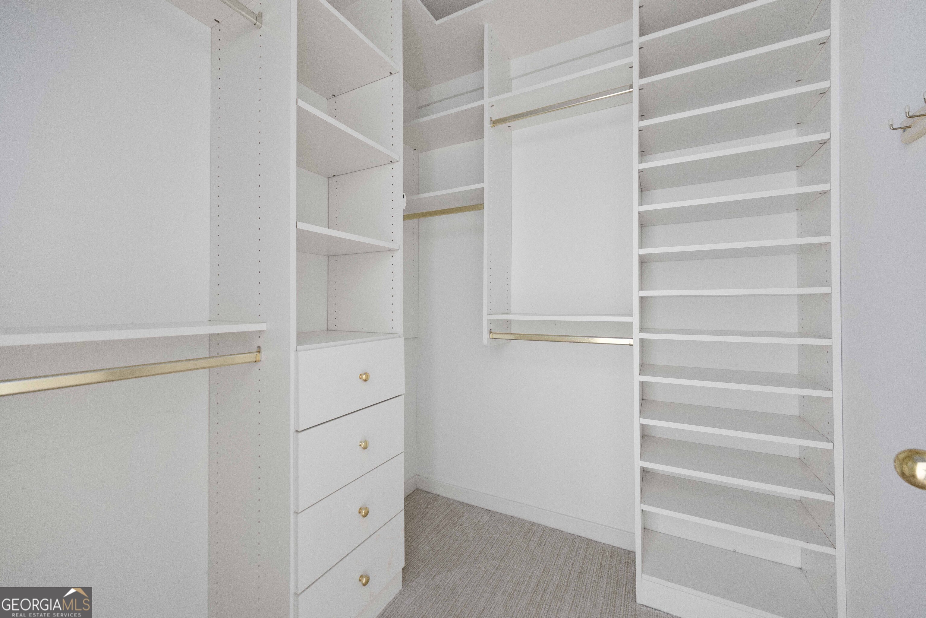4 Mountain Ridge Court Columbus, GA 31904 - Photo 54 of 142 a view of walk in closet with empty racks