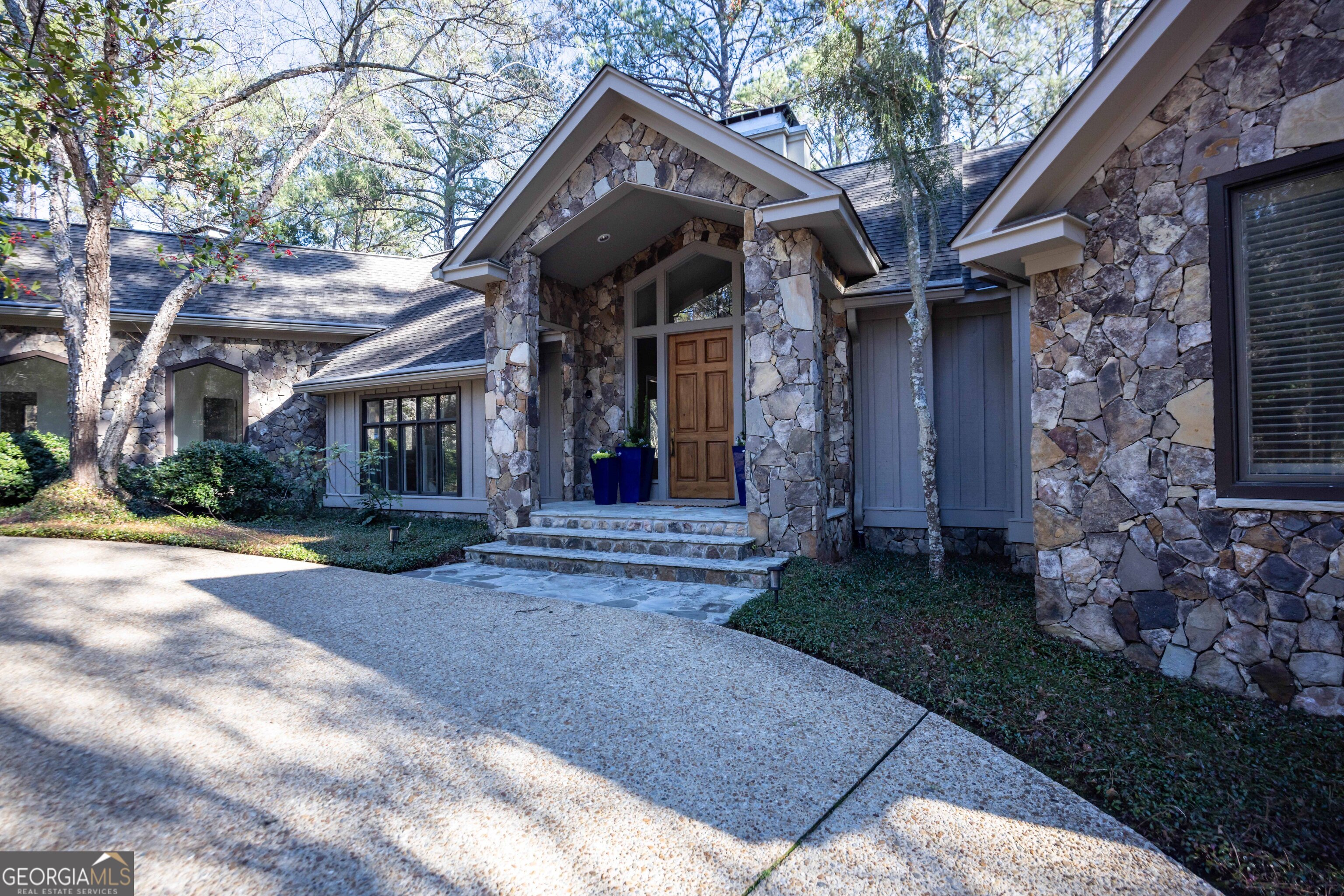 4 Mountain Ridge Court Columbus, GA 31904 - Photo 67 of 74 a view of a house with brick walls and a small yard