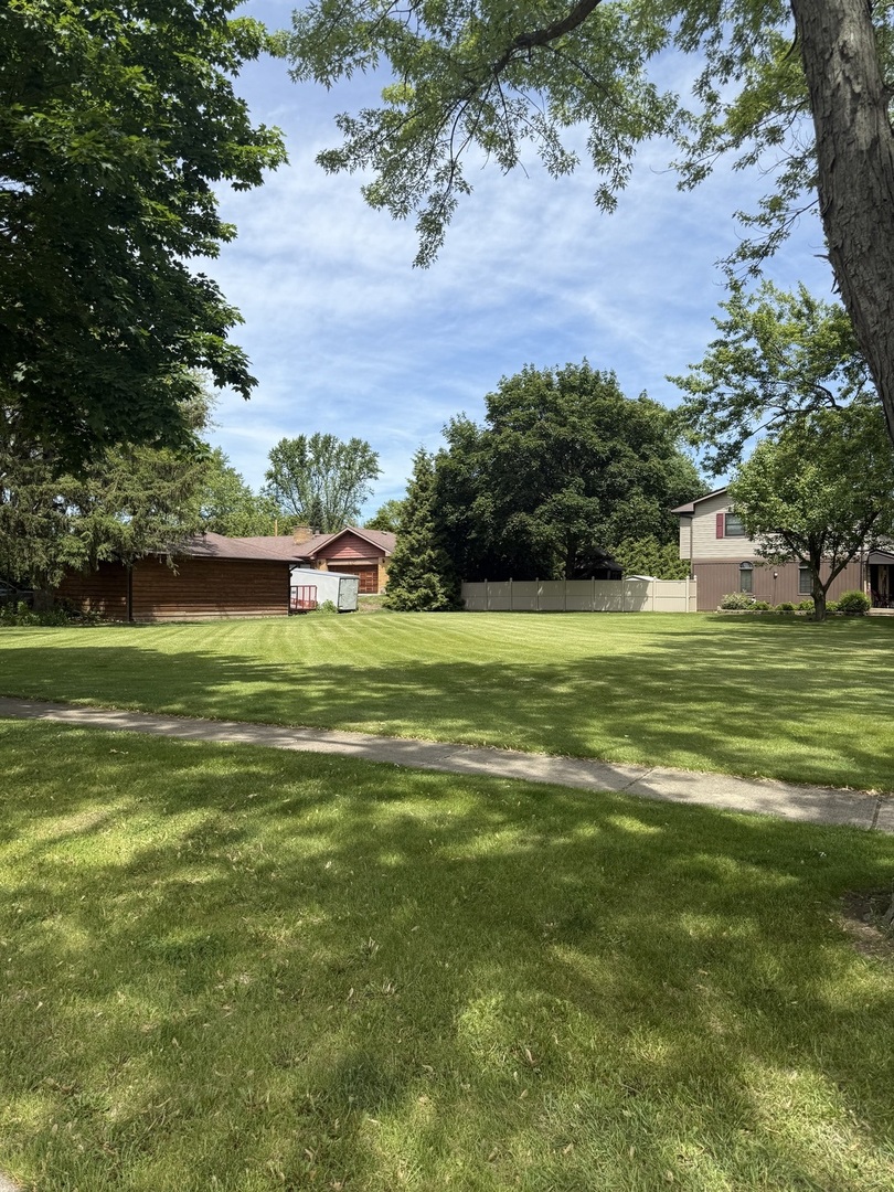 2110 Cherry Avenue Hanover Park, IL 60133 - Photo 2 of 2 a backyard of a house with lots of green space