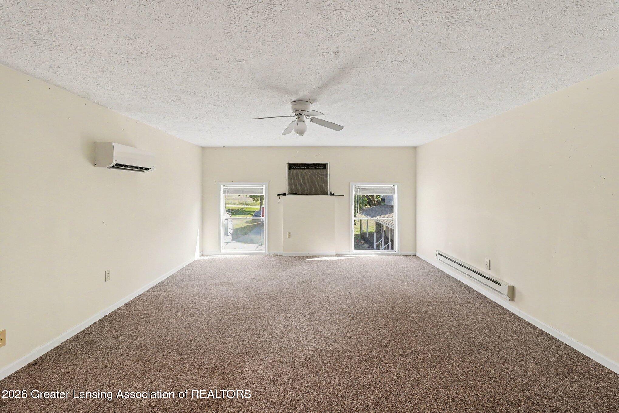 5490 West Howe Road Dewitt, MI 48820 - Photo 17 of 29 Garage bonus room 2