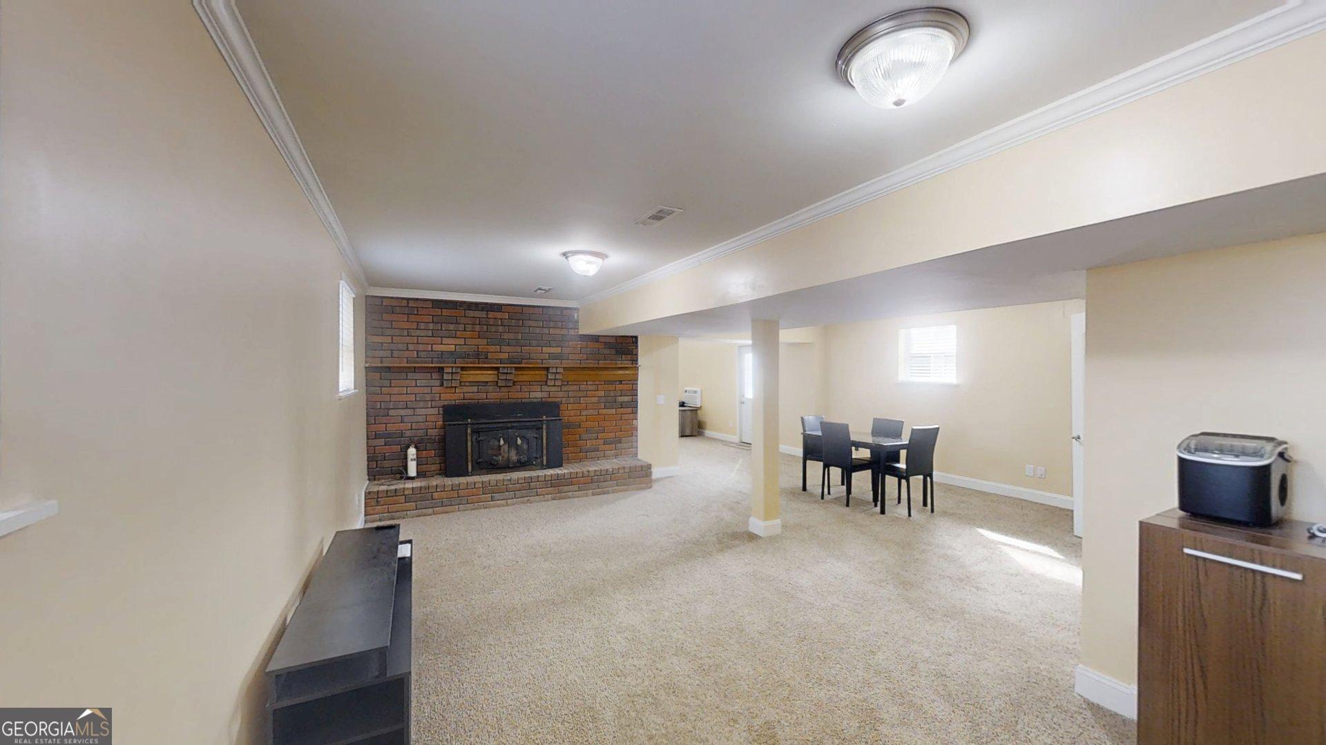 906 Diamond Circle LaFayette, GA 30728 - Photo 13 of 26 an empty room with furniture and a fireplace