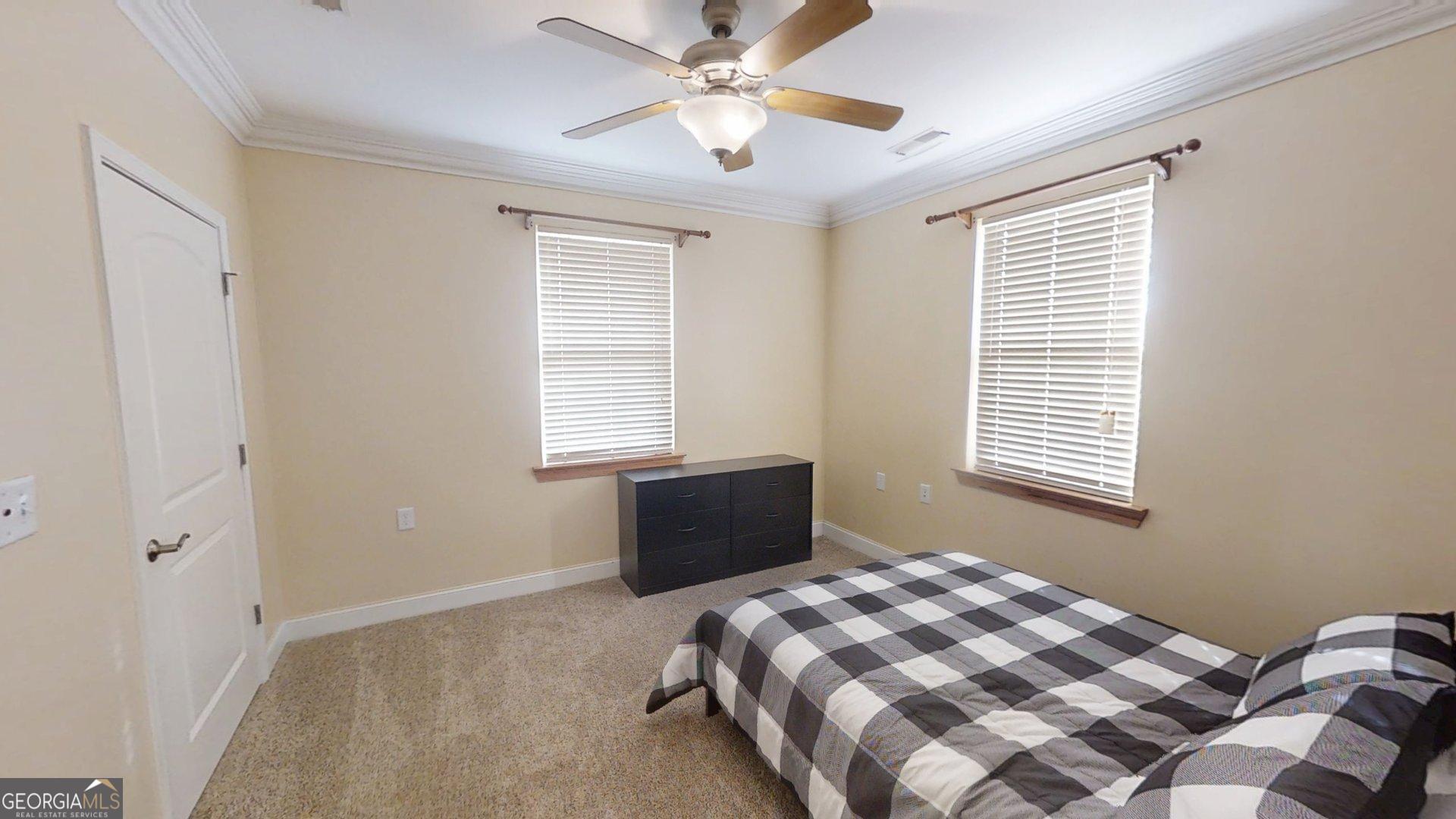 906 Diamond Circle LaFayette, GA 30728 - Photo 18 of 26 a bedroom with a bed and a window