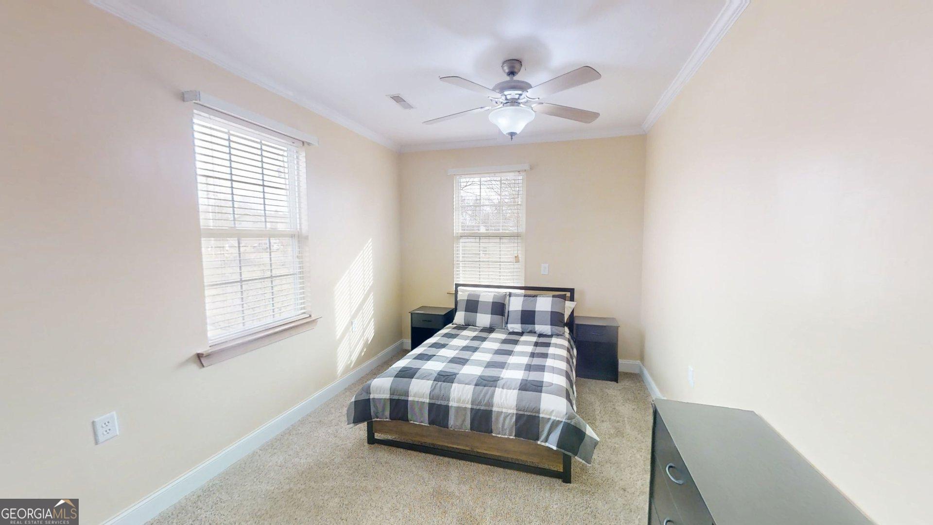906 Diamond Circle LaFayette, GA 30728 - Photo 23 of 26 a bedroom with a bed and window