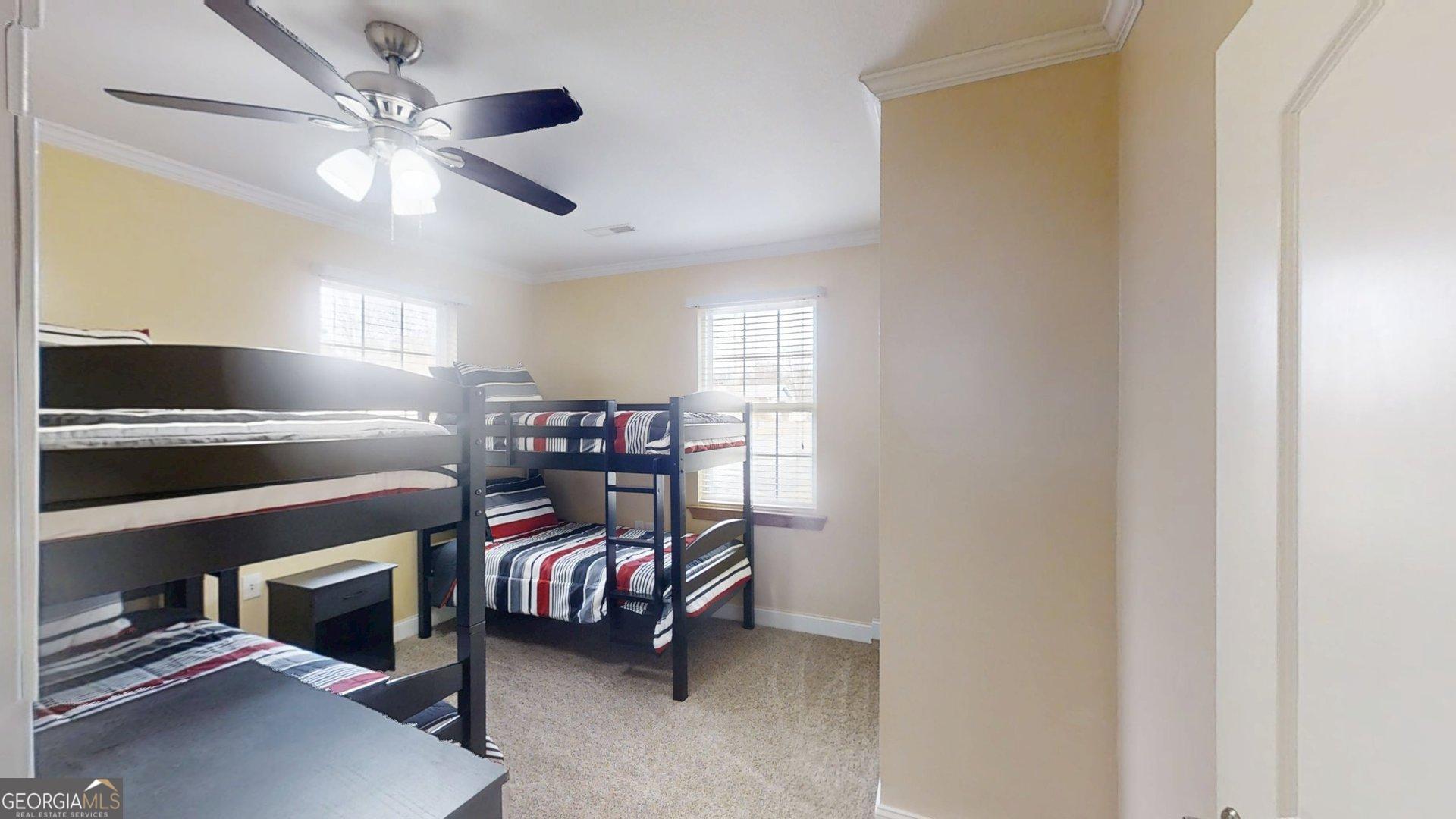906 Diamond Circle LaFayette, GA 30728 - Photo 24 of 26 a bedroom with furniture and a chandelier