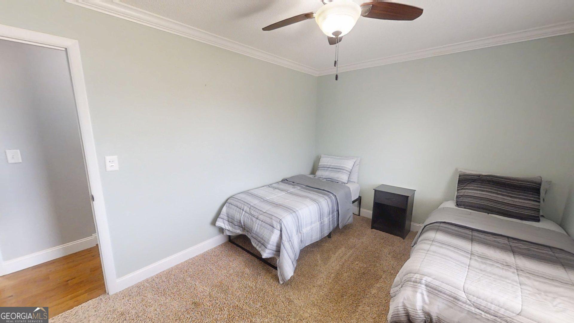 906 Diamond Circle LaFayette, GA 30728 - Photo 8 of 26 a bedroom with a bed and a dresser