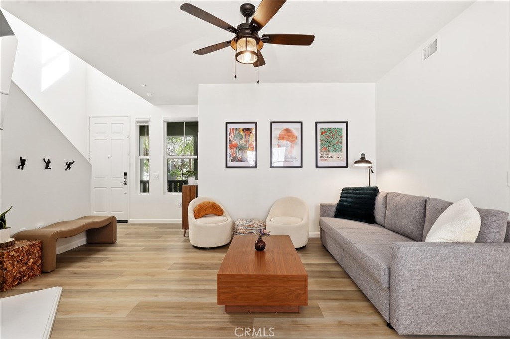 52 Valmont Way Ladera Ranch, CA 92694 - Photo 3 of 29 a living room with furniture and wooden floor