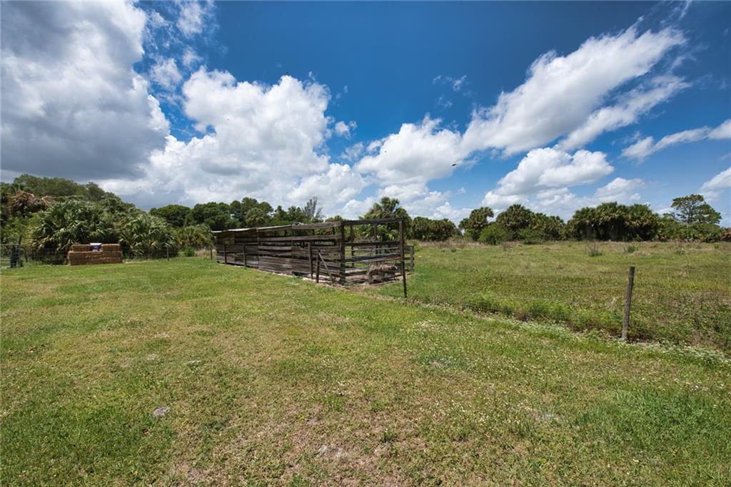 3025 Matthews Road Fort Pierce, FL 34945 - Photo 17 of 35 a view of outdoor space and yard